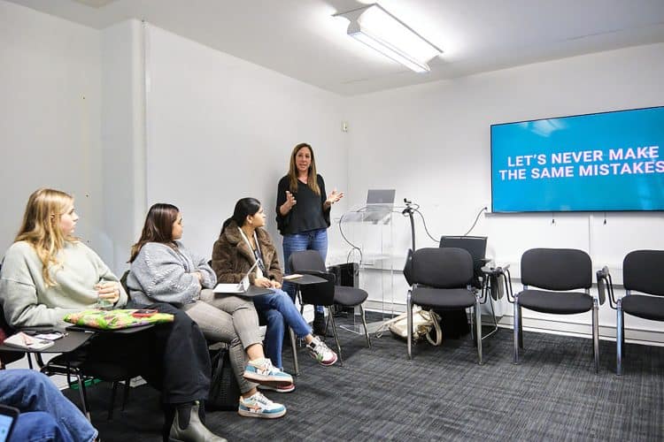 Patricia Ullbrich speaking at the Sustainability Symposium at Vogue College of Fashion, London